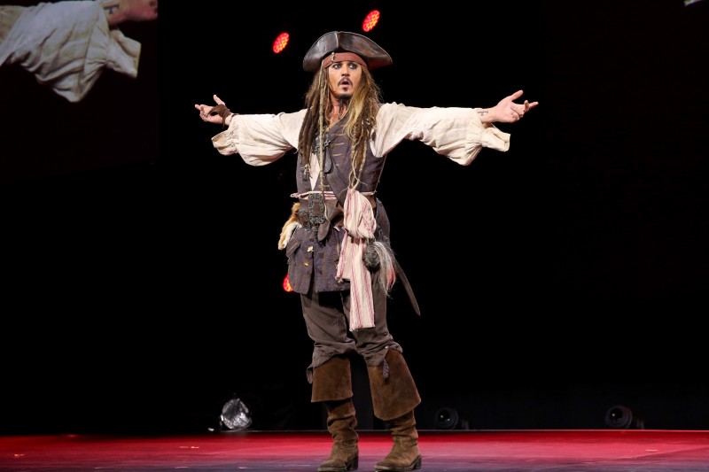 ANAHEIM, CA - AUGUST 15: Actor Johnny Depp, dressed as Captain Jack Sparrow, of PIRATES OF THE CARIBBEAN: DEAD MEN TELL NO TALES took part today in "Worlds, Galaxies, and Universes: Live Action at The Walt Disney Studios" presentation at Disney's D23 EXPO 2015 in Anaheim, Calif. (Photo by Jesse Grant/Getty Images for Disney) *** Local Caption *** Johnny Depp