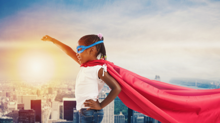child dressed as superhero