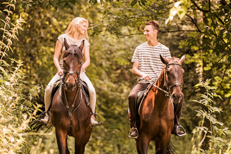 Couple Horseback riding
