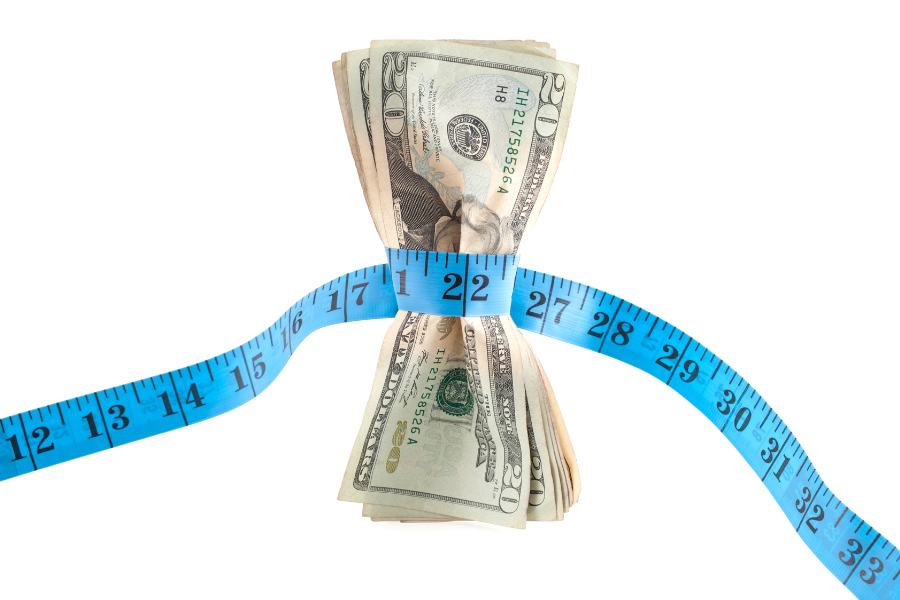 cash with measuring tape