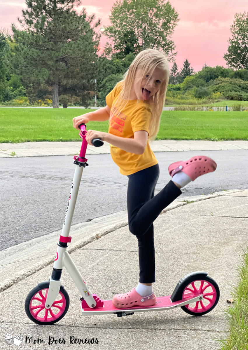 Girl on Globber scooter
