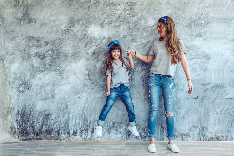 mom with daughter with jeans