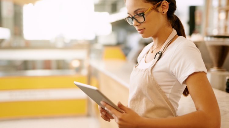 woman reading reviews on ipad