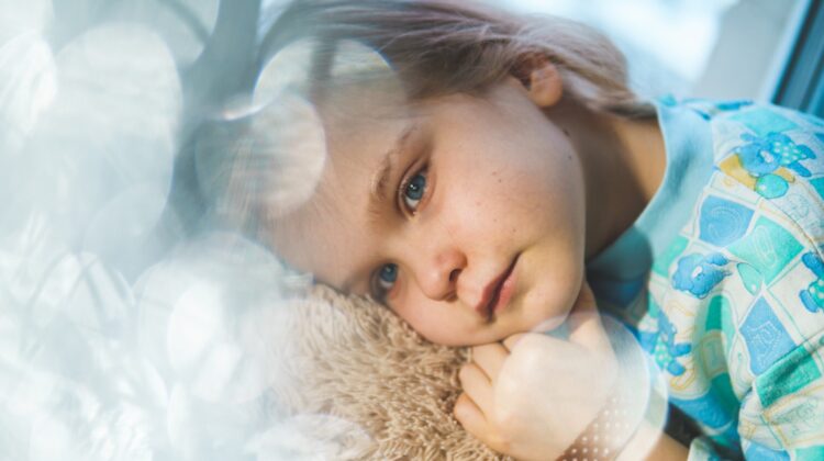 little girl looking sad or sick