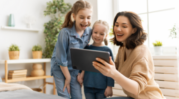 parents and kids with tablet