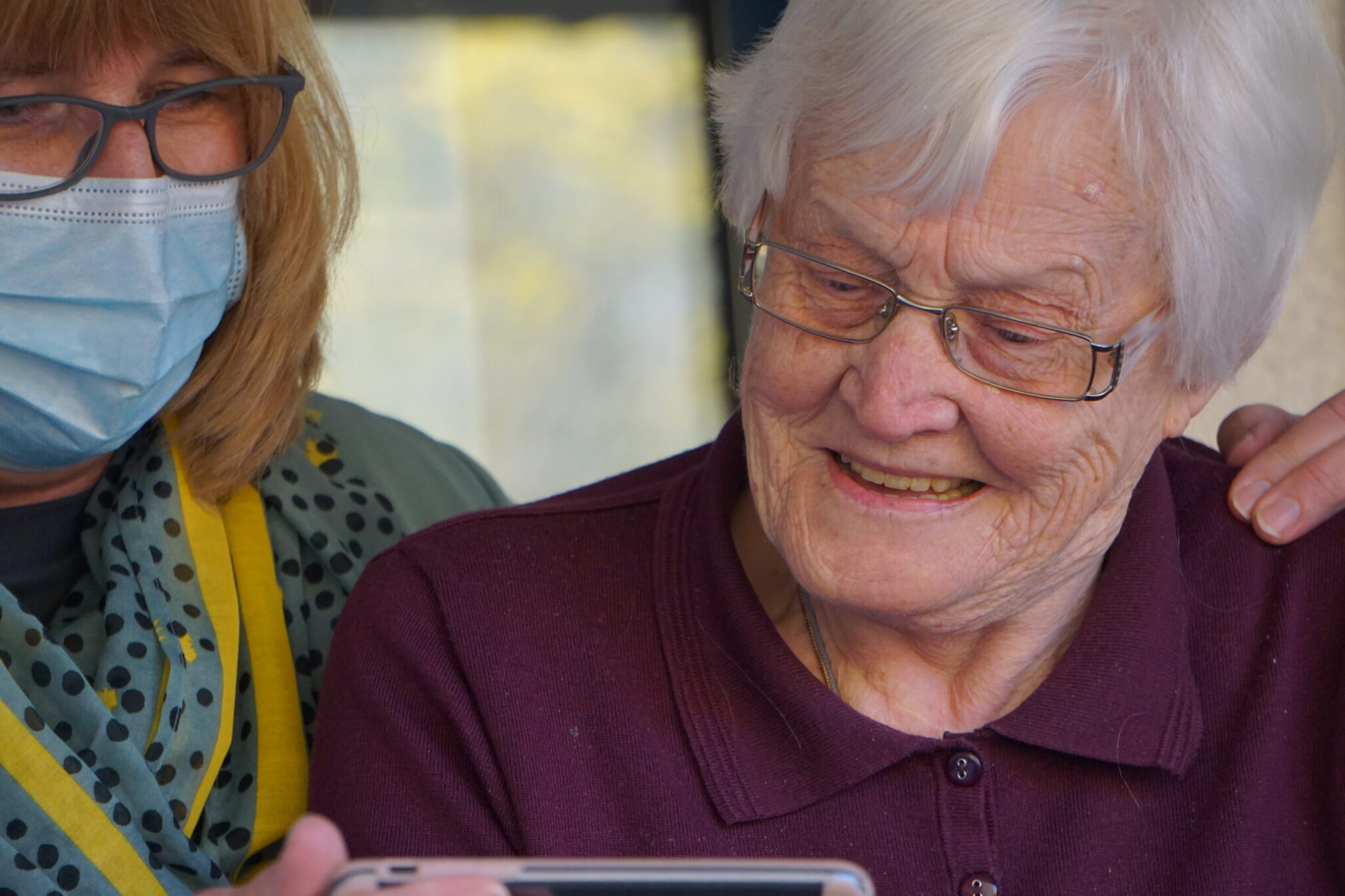 woman with elderly woman