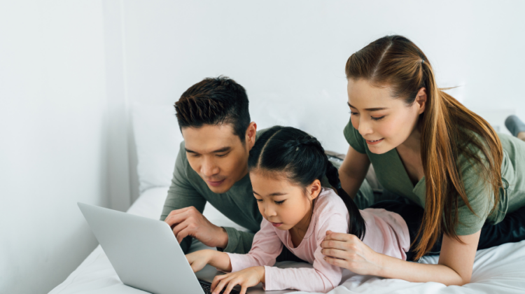 family with laptop