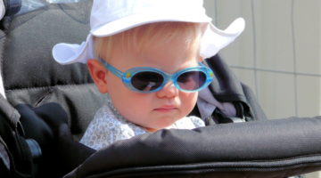 baby in stroller with sunglasses