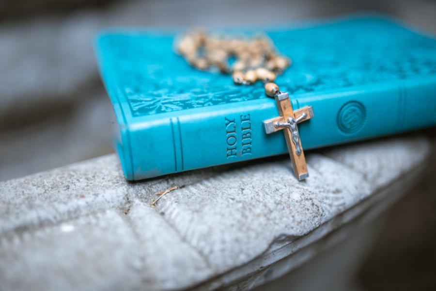 crucifix on Bible