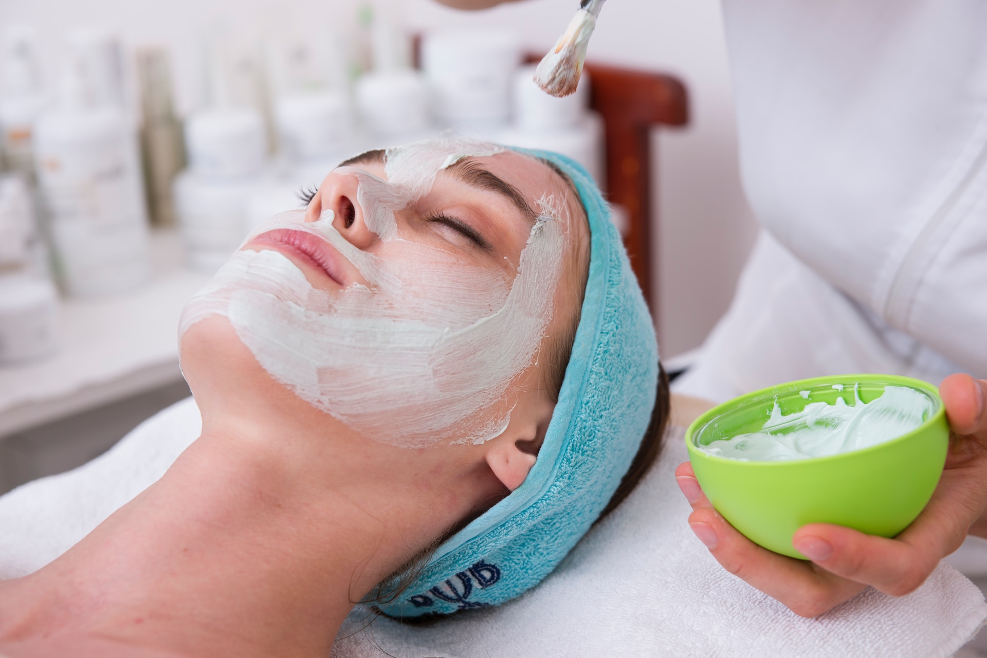 woman having facial beauty treatment