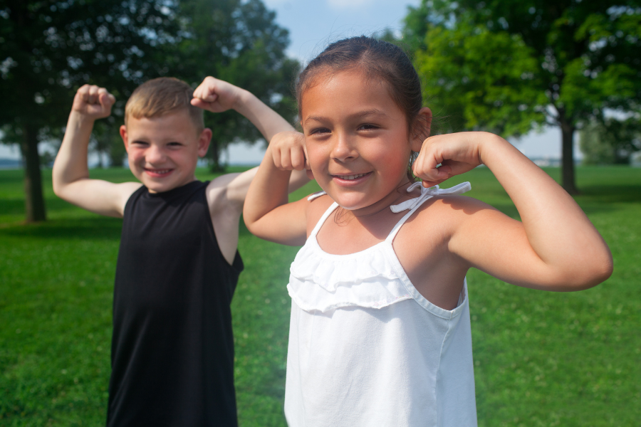 kids showing muscles