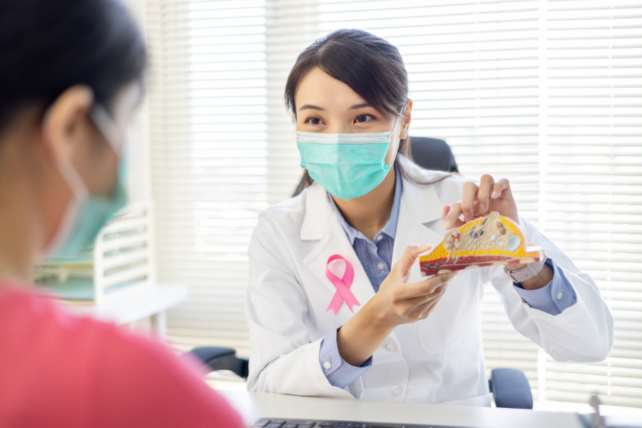 doctor explaining breast cancer