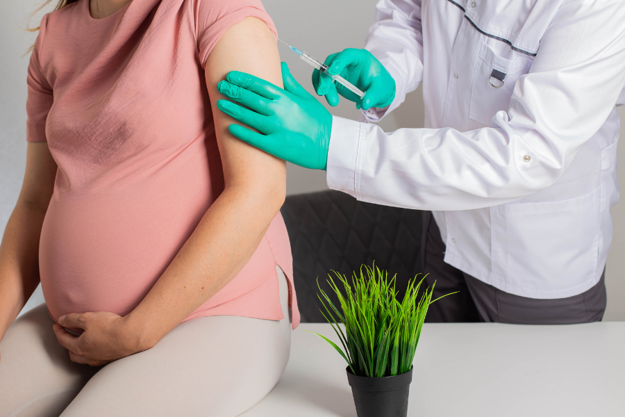 pregnant woman getting injection