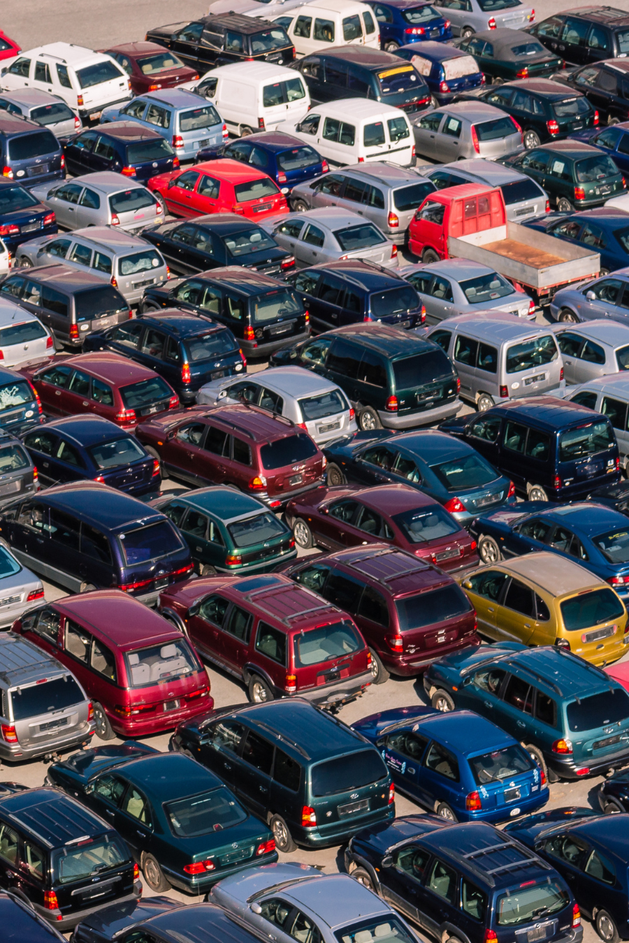 used cars packed in a lot