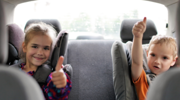 children in back seat in car seats