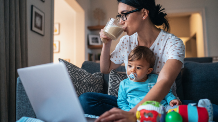 mom with baby in front of laptop