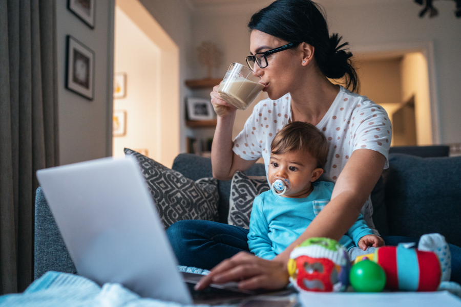 mom with baby in front of laptop