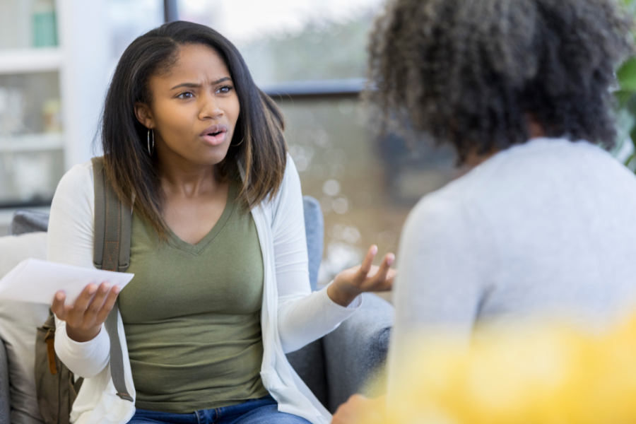 teen talking with parent