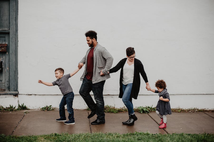 family walking on street