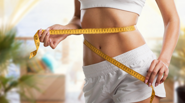 weight loss with measuring tape