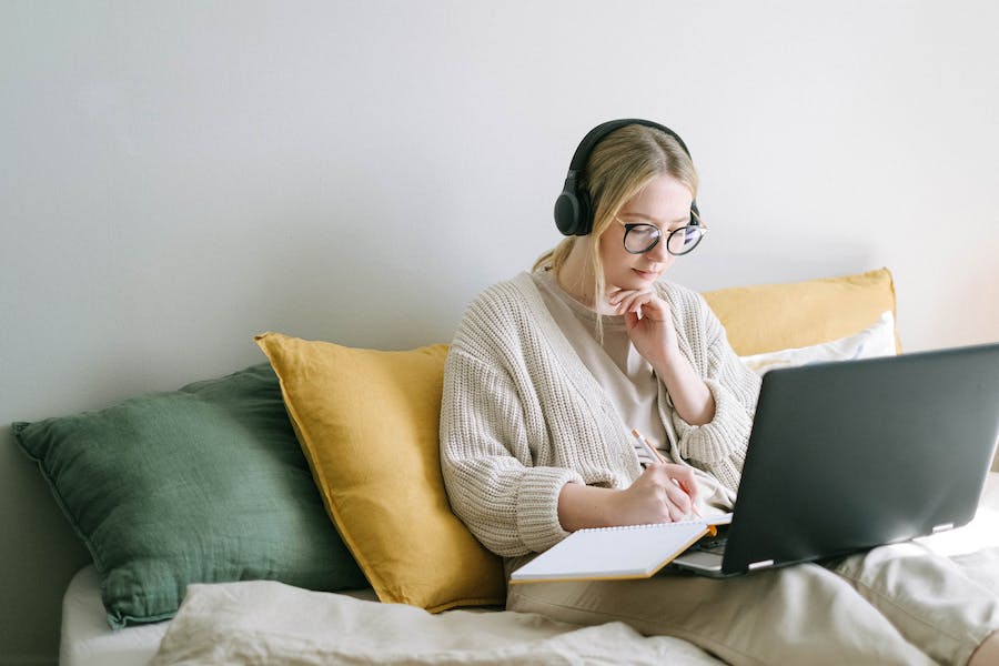 woman taking notes