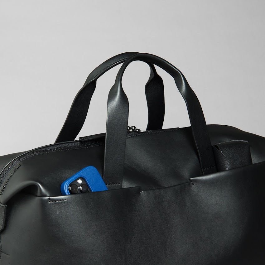 Troubadour bag outside pocket