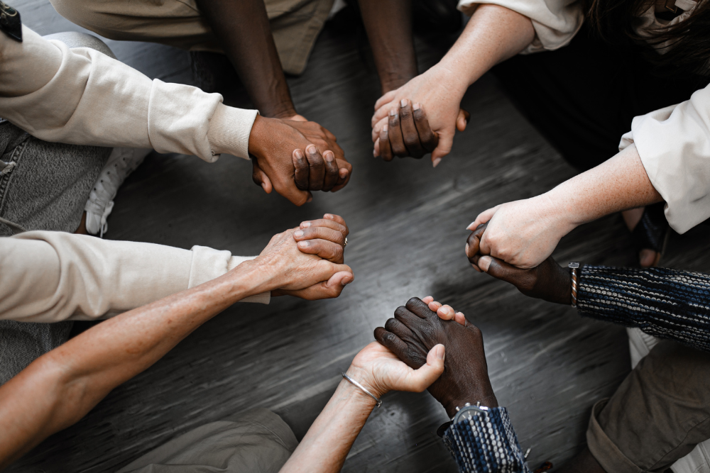 group holding hands