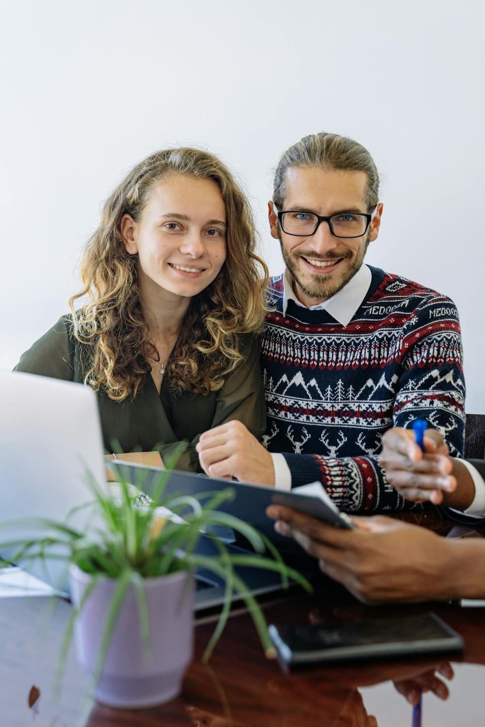 man and woman with laptop