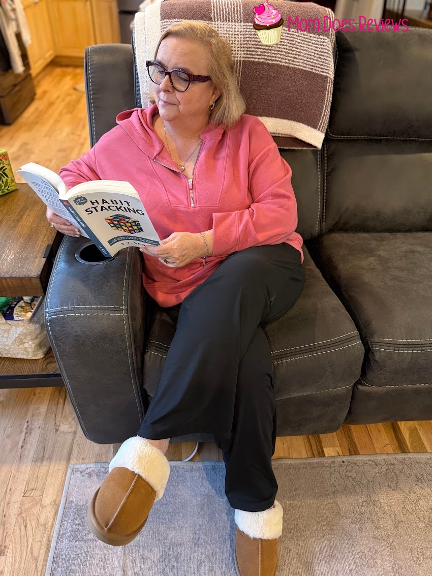 Woman reading a book wearing Stelle lounge pants
