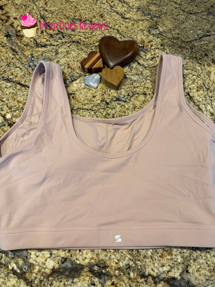 Stelle SoftLuxe sports bra laying on a counter