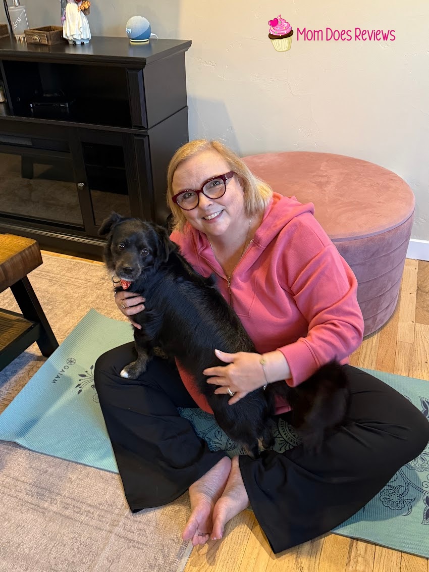 A Woman and dog sitting on the floor in fleece lined flare leggings