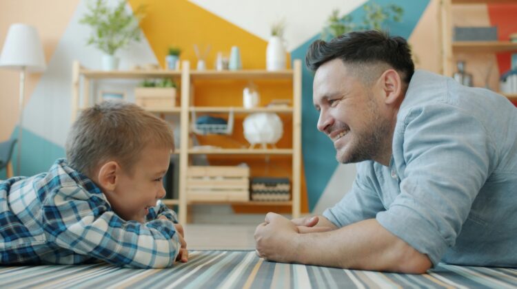 kid and dad on floor