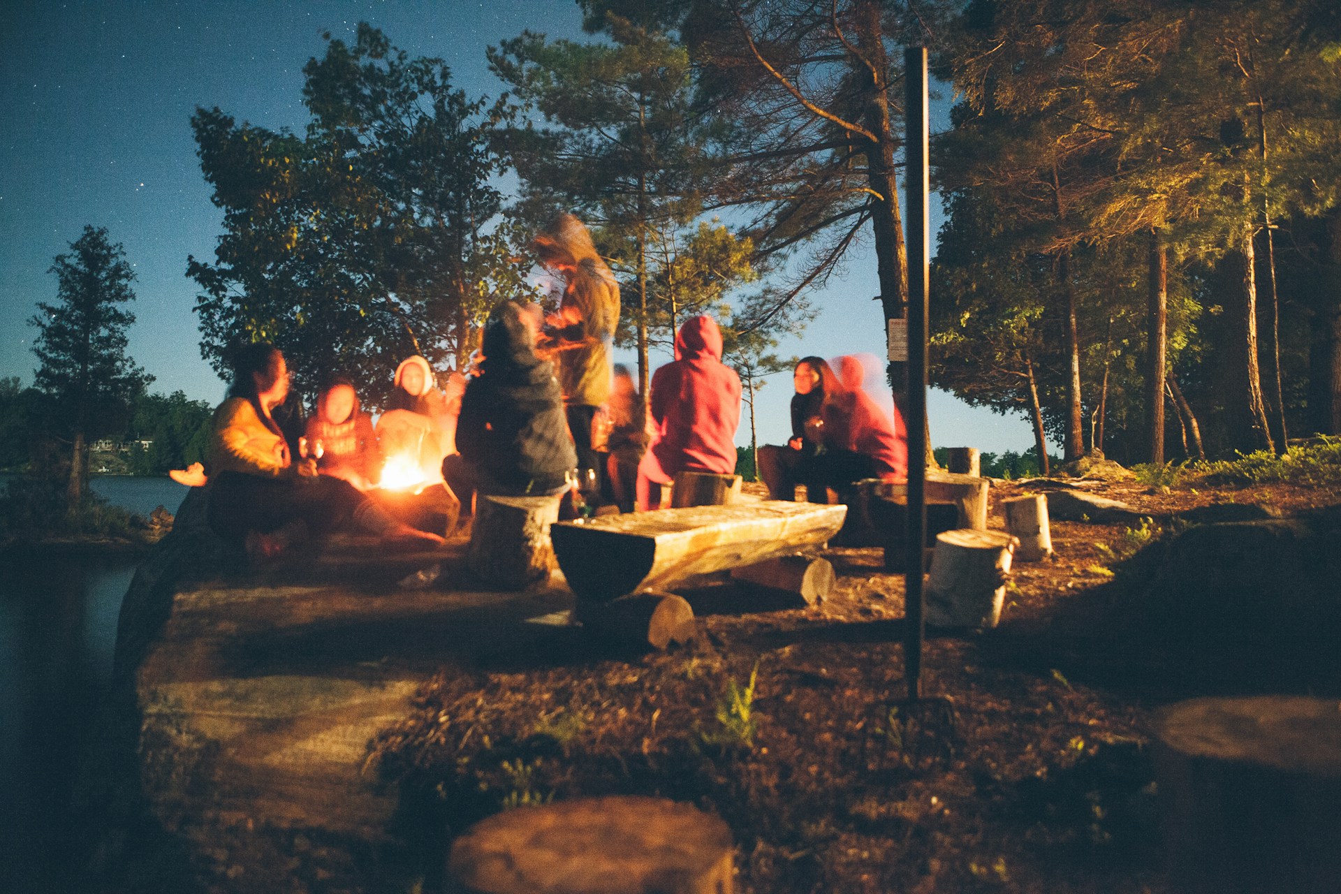 Sleepaway camp around campfire