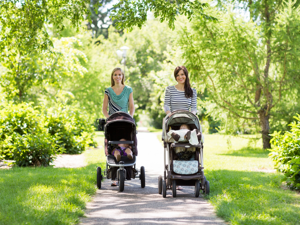 2 moms with baby strollers
