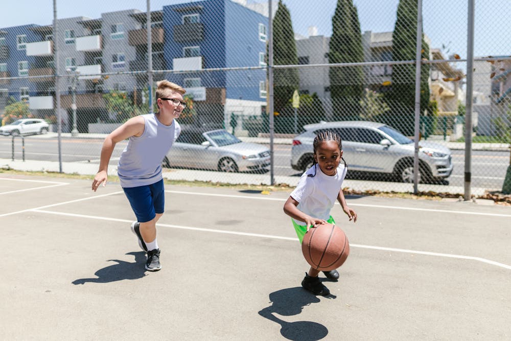 Kids playing basketball.