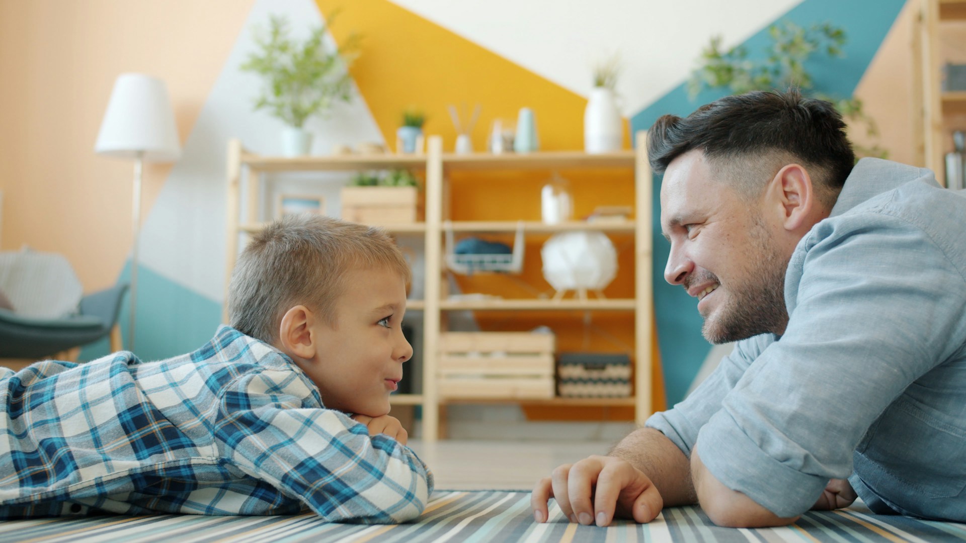 father and son looking at each other