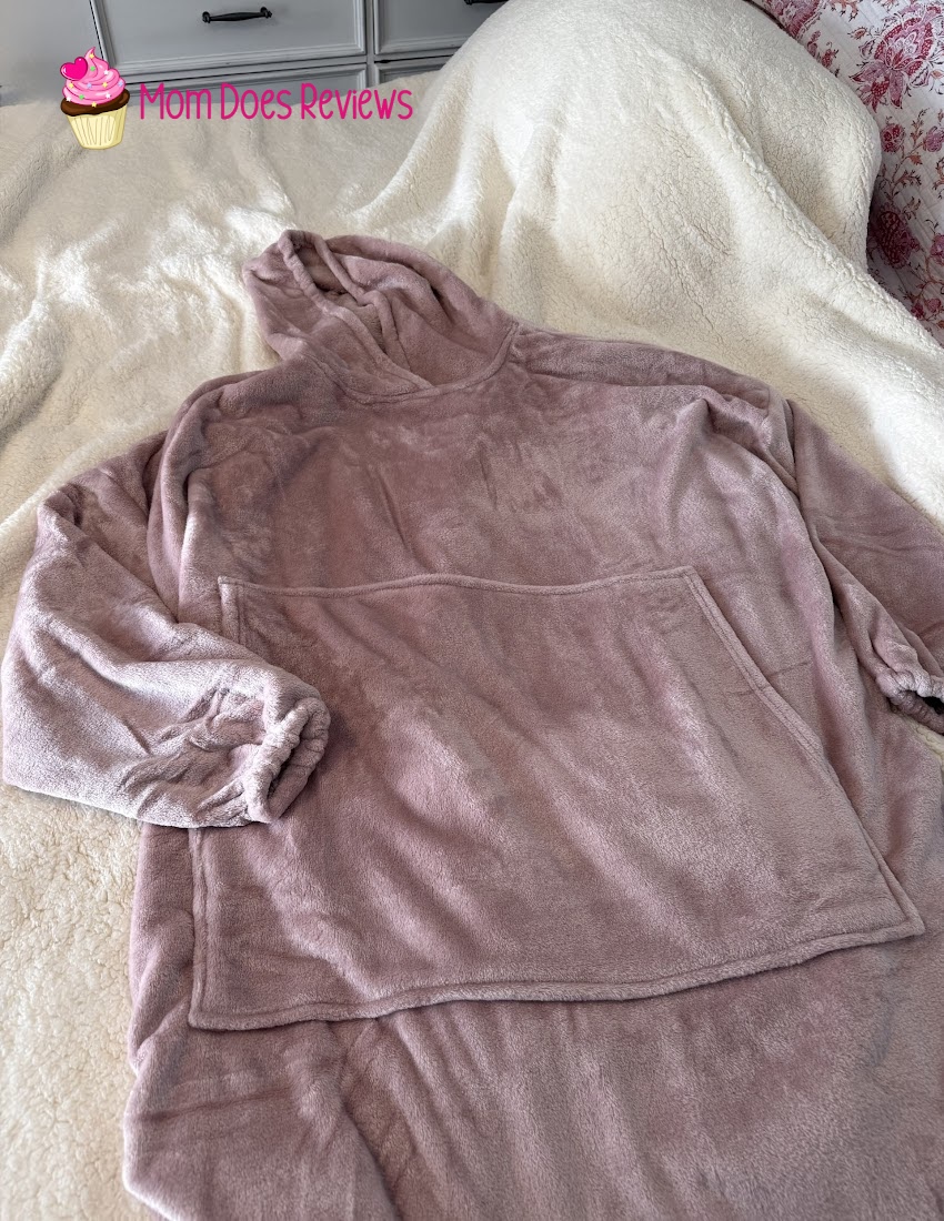 Heat Holders mega hoodie on the bed