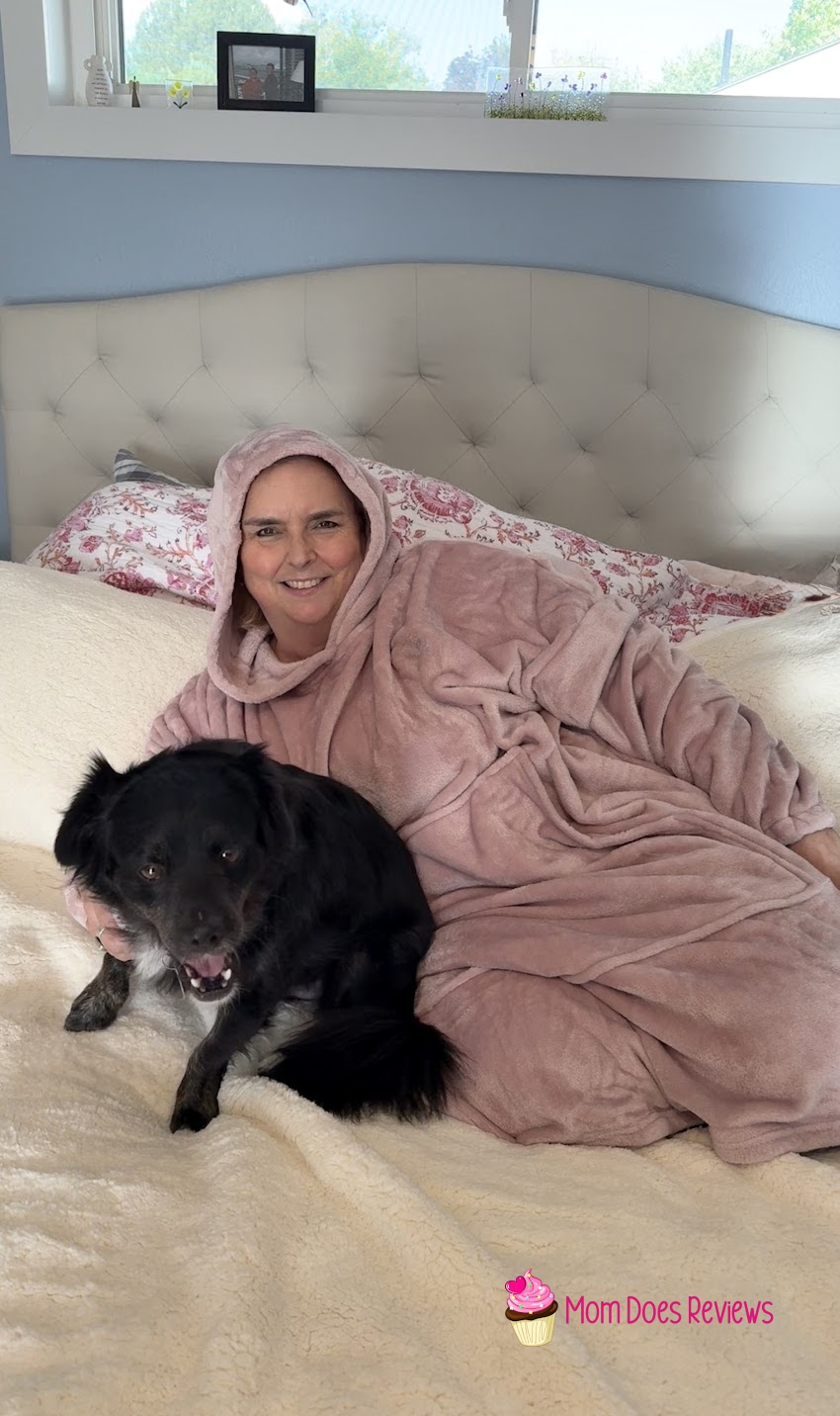 Heat Holders Mega Hoodie on a woman with a dog