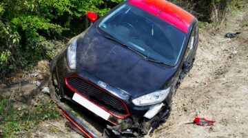 car crash on dirt road
