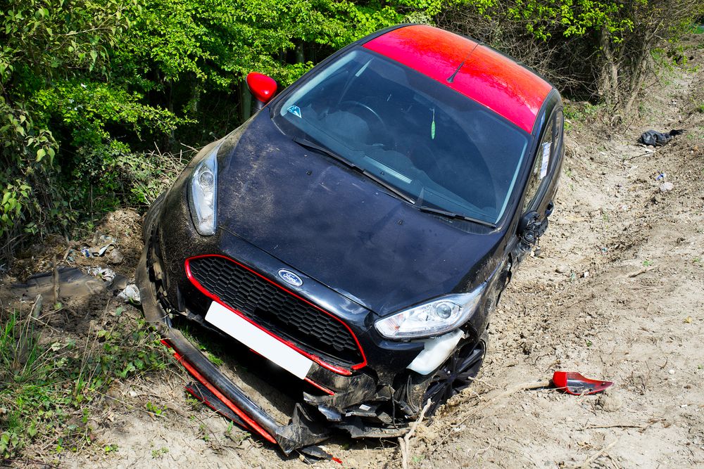 car crash on dirt road