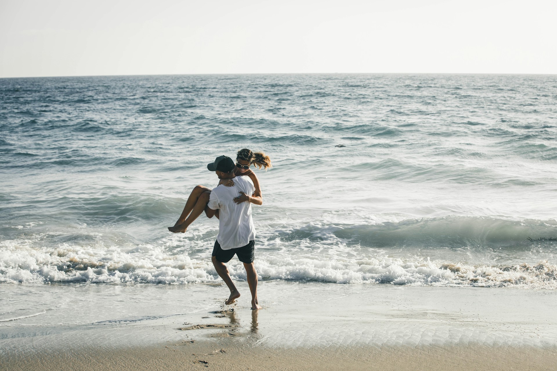 man and woman on beach