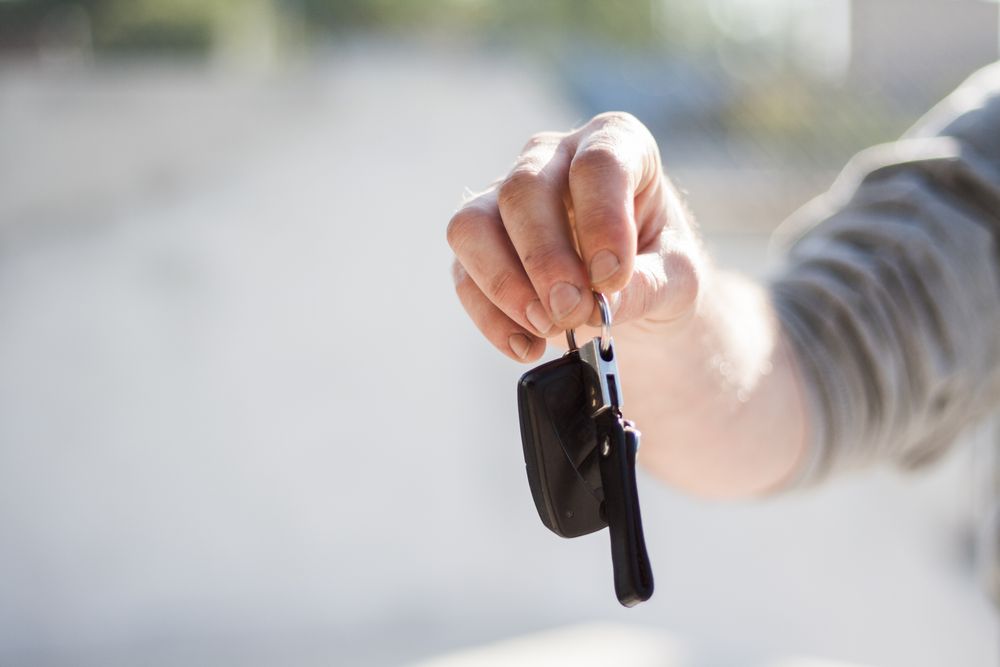 person holding keys