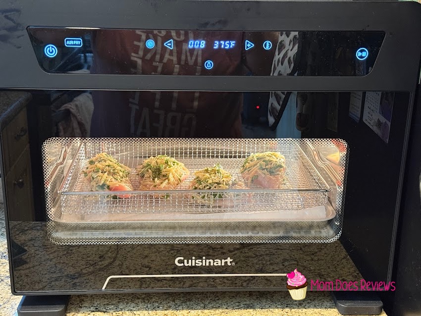 chicken cooking inside the Cuisinart 10-in-1