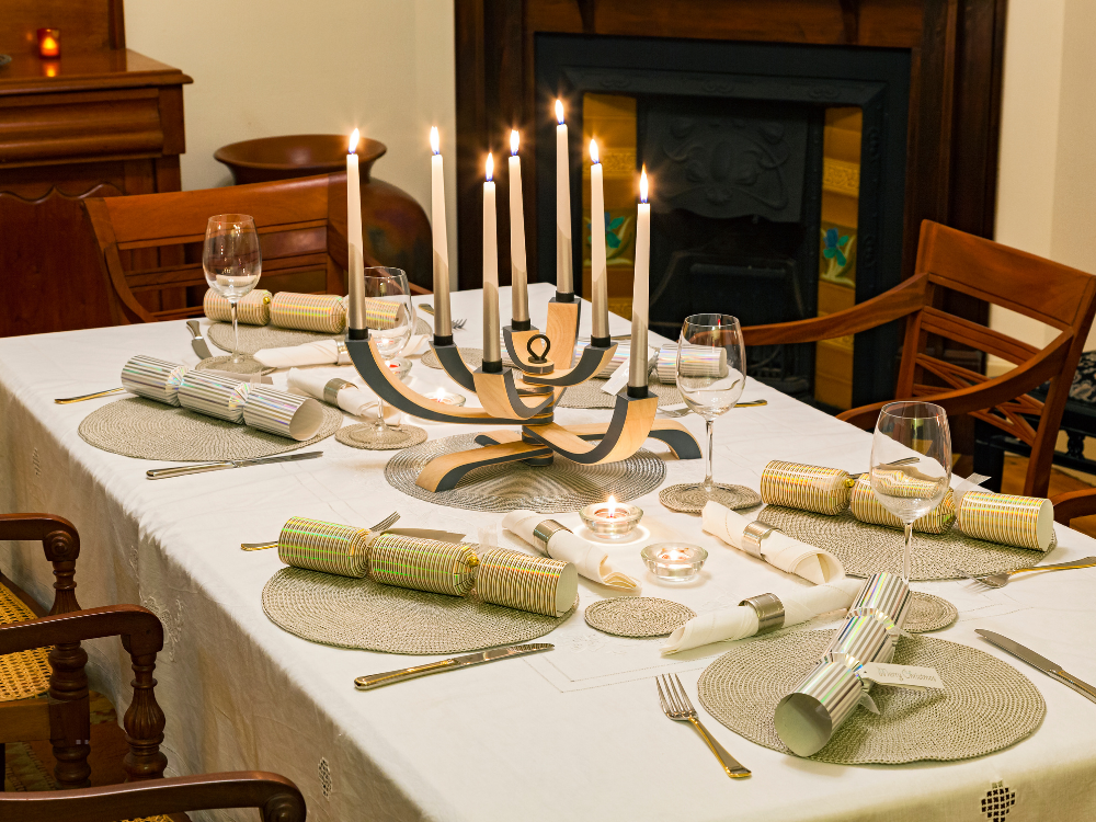 Table setting for dinner with glowing candelabra