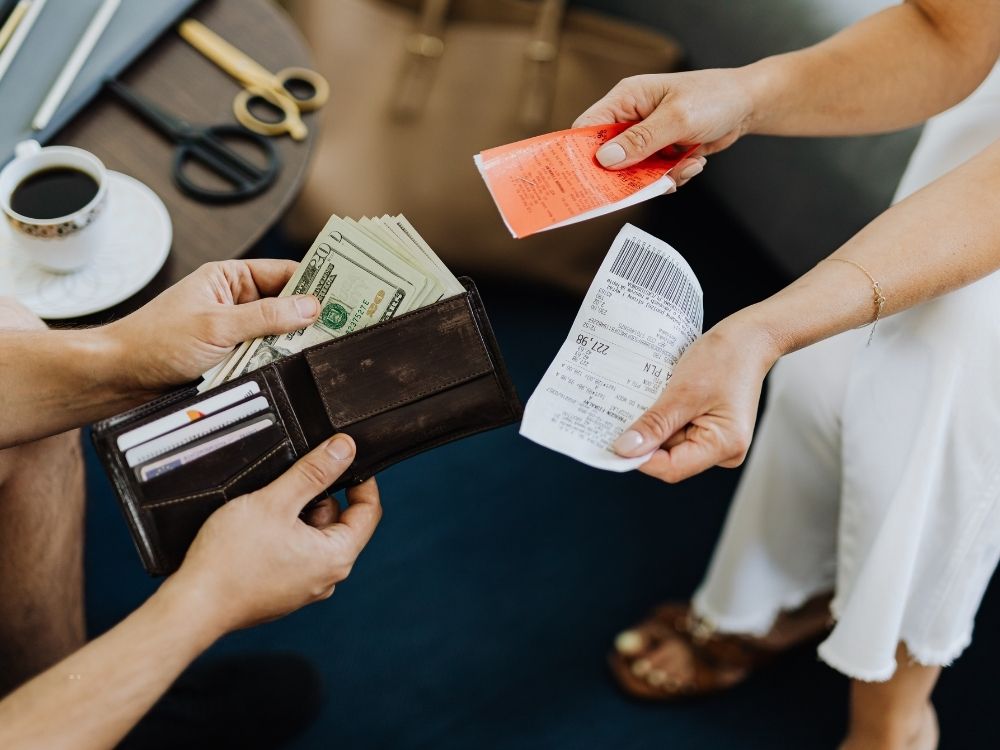 money in wallet dining out