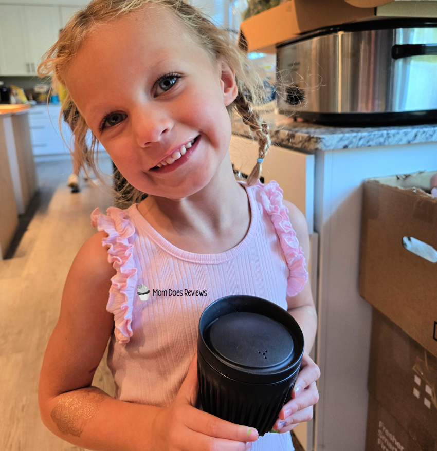 Little Girl with a cup o juice