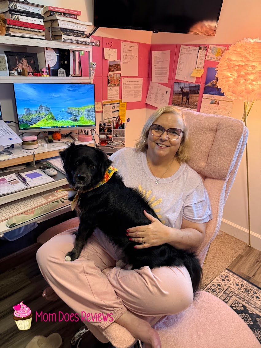 Homrelaxa chair with a woman and a dog sitting in it
