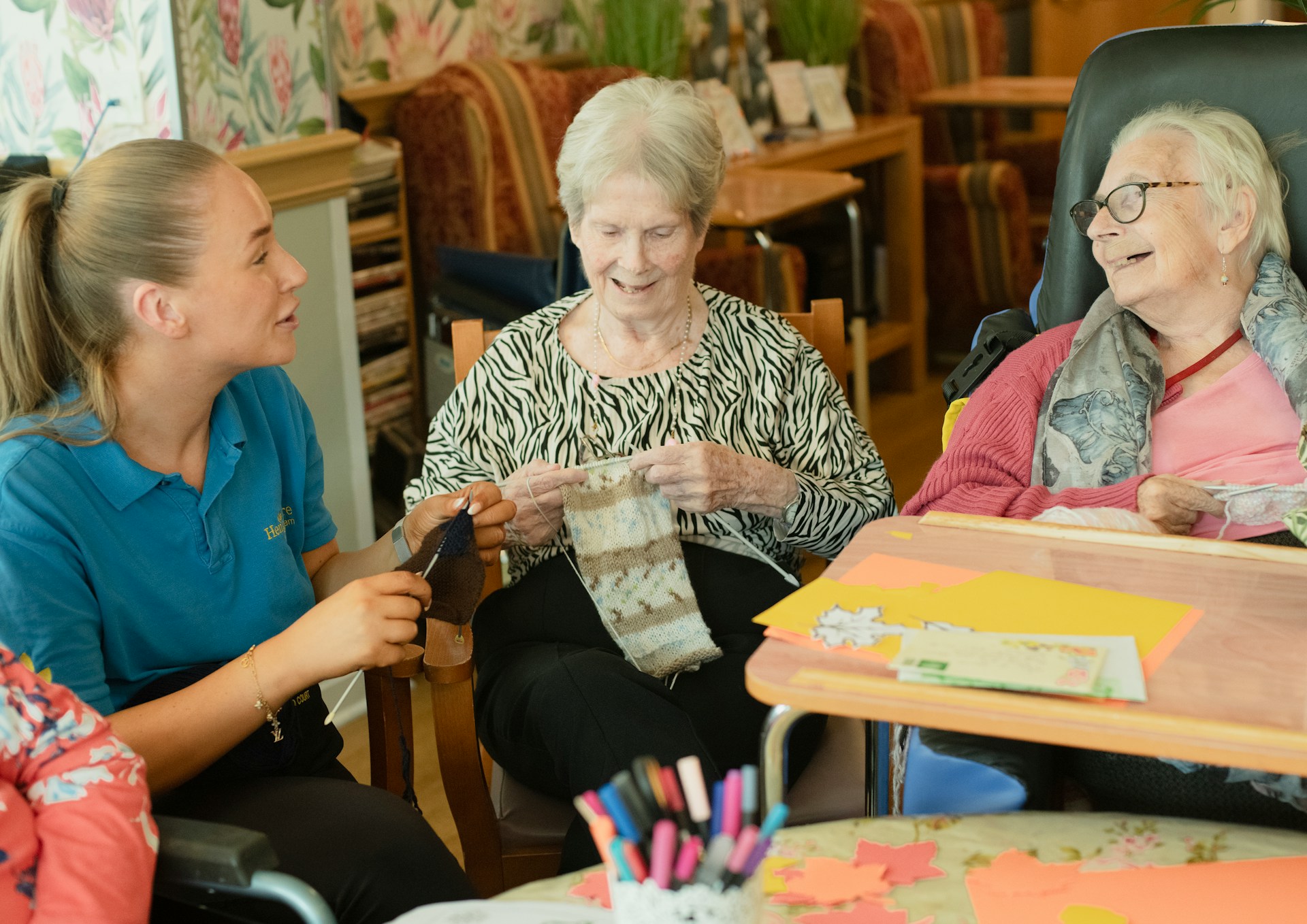 caregiver with 2 older women
