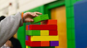 child piling blocks