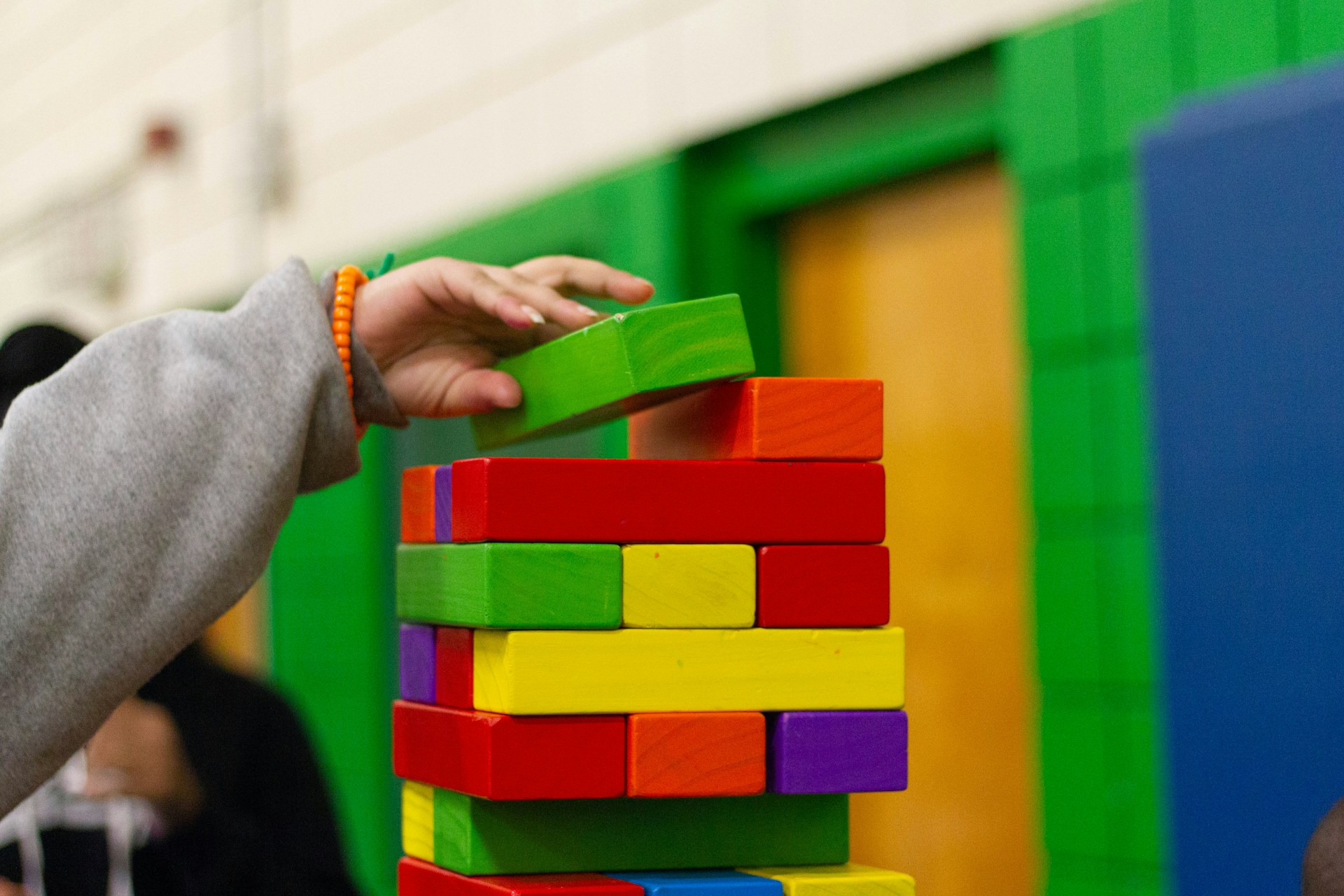 child piling blocks